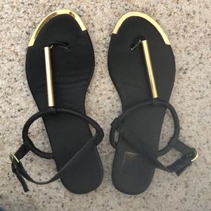 Dolce Vita black and gold metal sandals